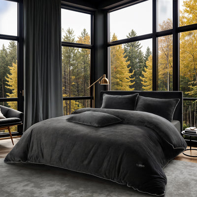 Luxury velvet bedding set on a queen bed in elegant bedroom decor